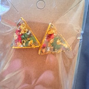 18k gp Handcrafted with pressed flowers and resin, gold foil flakes, mica.